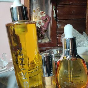 Skinn cosmetics Devine Elixir Luminous oil, shower Cleanser and Lip plumping eli
